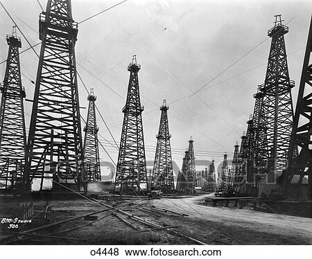 Stock Photo - 1930S Famous Spindletop Oil Field Beaumont Texas Rows Of Wooden Oil Rigs Derricks . Fotosearch