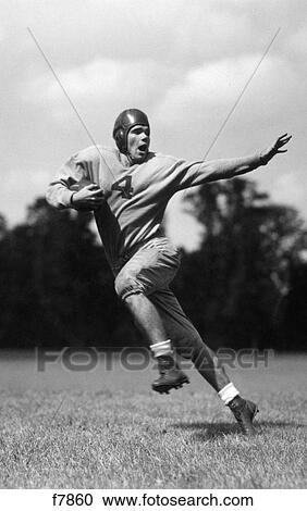 1930S Football Player Running With Ball View Large Photo Image Stock Image - 1930S Football Player Running With Ball . Fotosearch