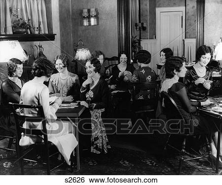 1930S Groups Of Women Seated At Three Tables At Card Party View Large Photo Image Stock Photograph - 1930S Groups Of Women Seated At Three Tables At Card Party . Fotosearch