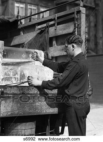 1930S Ice Delivery Man Standing At Back Of Truck Holding Tongs In One Hand & Putting Ice Pick In Block Of Ice With Other View Large Photo Image Stock Image - 1930S Ice Delivery Man Standing At Back Of Truck Holding Tongs In One Hand & Putting Ice Pick In Block Of Ice With Other. Fotosearch