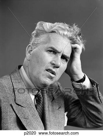 1930S Man Portrait Hand Held Up To Head Facial Expression Forgetful Confused Contemplative Suit Tie Business View Large Photo Image Stock Image - 1930S Man Portrait Hand Held Up To Head Facial Expression Forgetful Confused Contemplative Suit Tie Business . Fotosearch