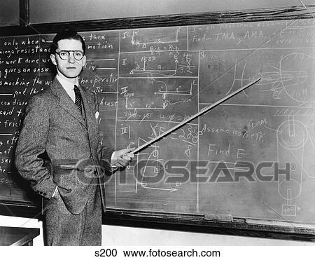 1930S Man Teacher Looking At Camera With Pointer At Blackboard View Large Photo Image Stock Image - 1930S Man Teacher Looking At Camera With Pointer At Blackboard . Fotosearch