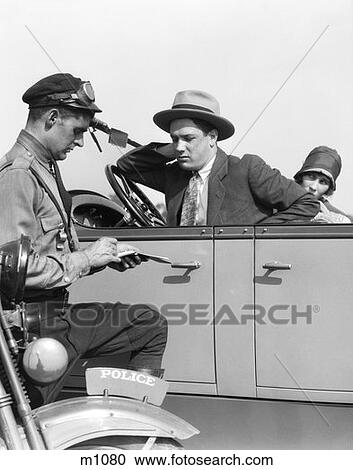 1930S Motorcycle Cop Writing A Ticket To A Couple Sitting In Convertible Sedan The Man Is Frowning View Large Photo Image Stock Image - 1930S Motorcycle Cop Writing A Ticket To A Couple Sitting In Convertible Sedan The Man Is Frowning. Fotosearch