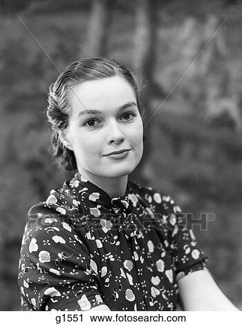 1930S Portrait Of Brunette Woman Wearing Printed Blouse Half Smile Mona Lisa Like Beautiful Eyes Looking At Camera View Large Photo Image Stock Image - 1930S Portrait Of Brunette Woman Wearing Printed Blouse Half Smile Mona Lisa Like Beautiful Eyes Looking At Camera . Fotosearch