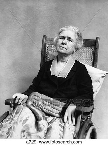 1930S Senior Old Woman In Wheelchair Cripple Age With Comforter Blanket Over Legs Geriatric Sad View Large Photo Image Stock Photo - 1930S Senior Old Woman In Wheelchair Cripple Age With Comforter Blanket Over Legs Geriatric Sad . Fotosearch