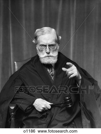 Stock Photograph - 1930S Stern Elderly Judge With Beard & And Glasses Pointing At Camera . Fotosearch