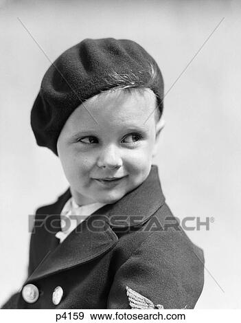 1930S Studio Portrait Of Young Boy Look To The Side Wearing A Beret And A Double Breasted Jacket View Large Photo Image Stock Photo - 1930S Studio Portrait Of Young Boy Look To The Side Wearing A Beret And A Double Breasted Jacket. Fotosearch