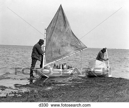1930S Two Men Small Boats Duck Decoy Preparing To Go Duck Hunting Shooting View Large Photo Image Stock Image - 1930S Two Men Small Boats Duck Decoy Preparing To Go Duck Hunting Shooting . Fotosearch
