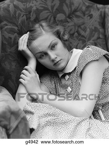 1930S Woman Moping Looking Sad Or Depressed Or With A Headache Leaning Her Head On Her Hand View Large Photo Image Stock Image - 1930S Woman Moping Looking Sad Or Depressed Or With A Headache Leaning Her Head On Her Hand. Fotosearch