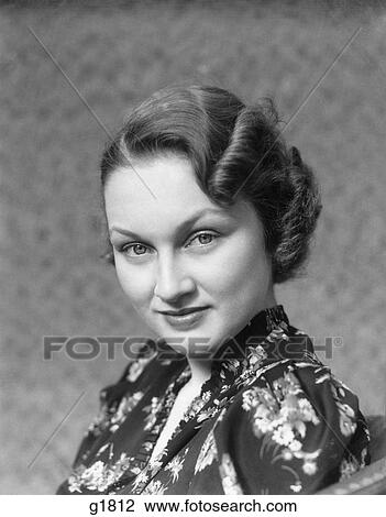 1930S Woman Portrait Head Shoulders Smiling At Camera Print Dress Beauty Fashion Hair Style View Large Photo Image Stock Image - 1930S Woman Portrait Head Shoulders Smiling At Camera Print Dress Beauty Fashion Hair Style . Fotosearch