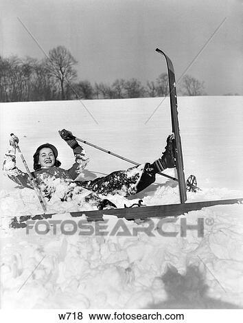 1930S Woman Skiier Fallen In Snow View Large Photo Image Stock Photo - 1930S Woman Skiier Fallen In Snow . Fotosearch