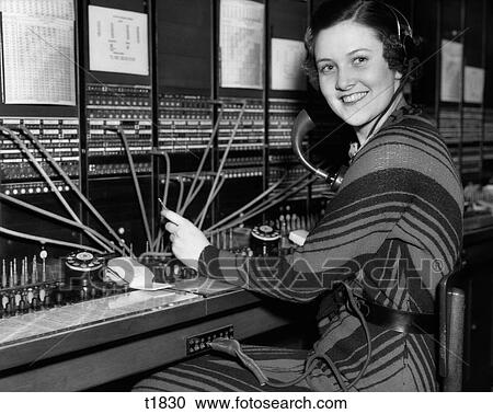 1930S Woman Telephone Operator At Switchboard View Large Photo Image Stock Image - 1930S Woman Telephone Operator At Switchboard. Fotosearch