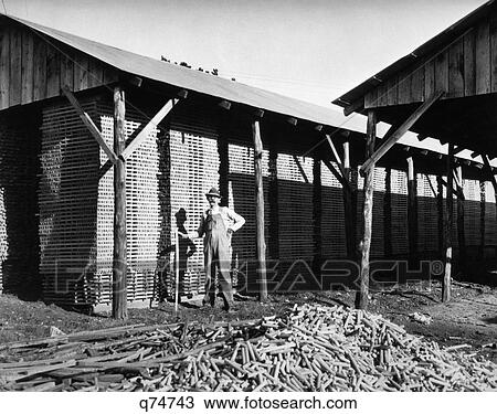 1930S Worker Piles Hickory Sticks At Golf Club And Chair Rung Factory In Arkansas View Large Photo Image Stock Image - 1930S Worker Piles Hickory Sticks At Golf Club And Chair Rung Factory In Arkansas. Fotosearch
