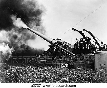 1930S Wwii Era Big Artillery Railroad Unit Men Firing Guns Outdoor View Large Photo Image Stock Photo - 1930S Wwii Era Big Artillery Railroad Unit Men Firing Guns Outdoor . Fotosearch