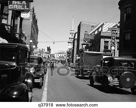 1935 1930S Retro Main Street Small Town Automobile Truck Pedestrian Traffic In Portsmouth New Hampshire View Large Photo Image Stock Photo - 1935 1930S Retro Main Street Small Town Automobile Truck Pedestrian Traffic In Portsmouth New Hampshire. Fotosearch
