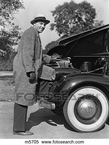 1939 1940S Retro Man Car Engine Pride Whitewall Hat View Large Photo Image Stock Photography - 1939 1940S Retro Man Car Engine Pride Whitewall Hat . Fotosearch