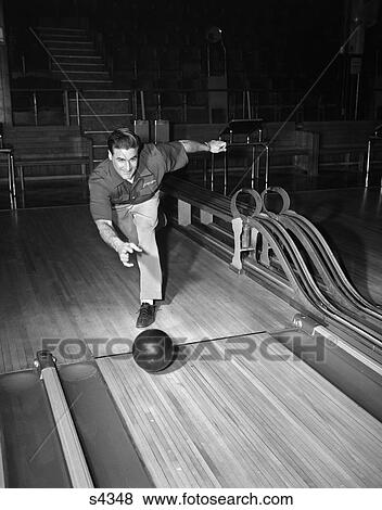 1940 1940S 1950 1950S Man Throwing Bowling Ball Down Alley View Large Photo Image Stock Photo - 1940 1940S 1950 1950S Man Throwing Bowling Ball Down Alley . Fotosearch