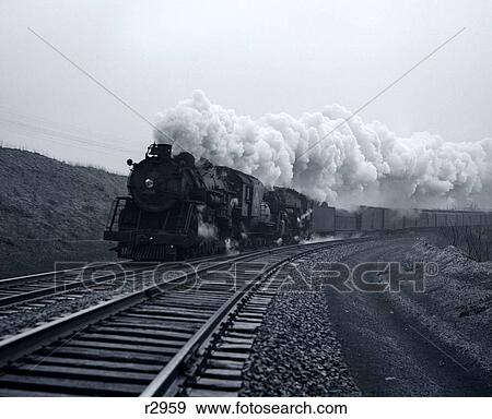 1940 1940S 1950 1950S Speeding Steam Locomotive Passenger Train Near Port Jervis New York View Large Photo Image Stock Photo - 1940 1940S 1950 1950S Speeding Steam Locomotive Passenger Train Near Port Jervis New York . Fotosearch