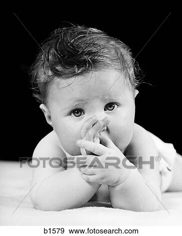 1940 1940S Baby Sucking Thumb Cute Retro View Large Photo Image Stock Photo - 1940 1940S Baby Sucking Thumb Cute Retro. Fotosearch