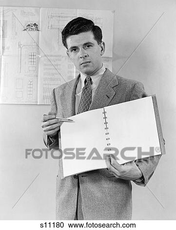 1940 1940S Business Man Holding Notebook And Pencil Presentation View Large Photo Image Stock Image - 1940 1940S Business Man Holding Notebook And Pencil Presentation . Fotosearch