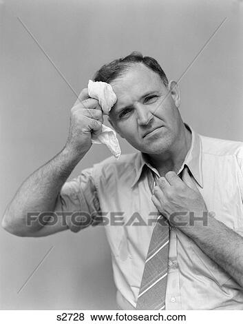 1940 1940S Business Man In Shirt And Tie Holding Handkerchief Wiping Forehead View Large Photo Image Stock Photo - 1940 1940S Business Man In Shirt And Tie Holding Handkerchief Wiping Forehead . Fotosearch