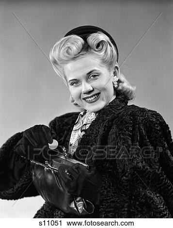 1940 1940S Dressed Up Woman Smiling Putting Change In Purse View Large Photo Image Stock Image - 1940 1940S Dressed Up Woman Smiling Putting Change In Purse . Fotosearch