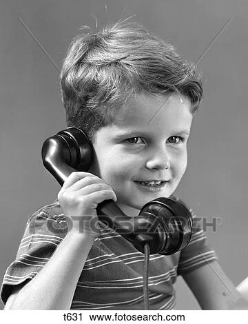 1940 1940S Little Boy Talking On Telephone View Large Photo Image Stock Image - 1940 1940S Little Boy Talking On Telephone . Fotosearch
