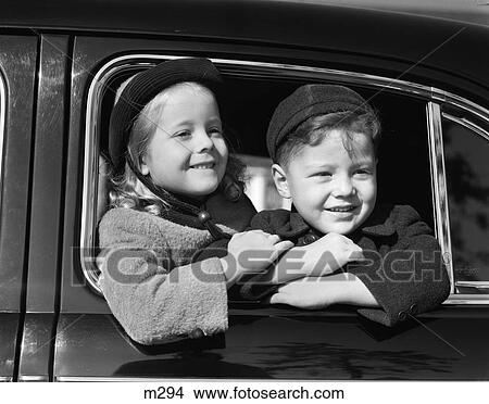 1940 1940S Retro Children Boy Girl Window Car Smile View Large Photo Image Picture - 1940 1940S Retro Children Boy Girl Window Car Smile . Fotosearch