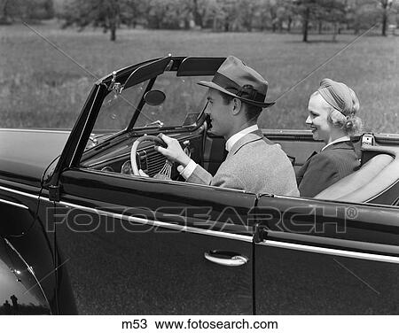 1940 1940S Retro Couple Driving Car Convertible Date View Large Photo Image Stock Image - 1940 1940S Retro Couple Driving Car Convertible Date . Fotosearch