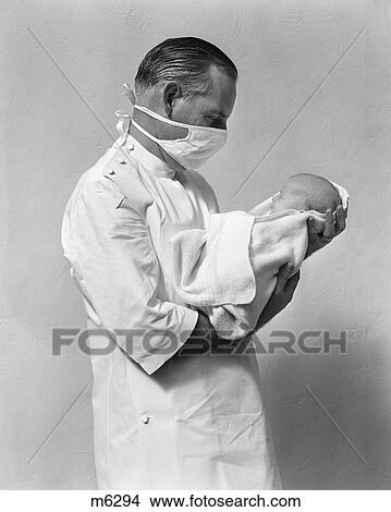 1940 1940S Retro Doctor Baby Newborn Infant Delivery Mask View Large Photo Image Picture - 1940 1940S Retro Doctor Baby Newborn Infant Delivery Mask . Fotosearch