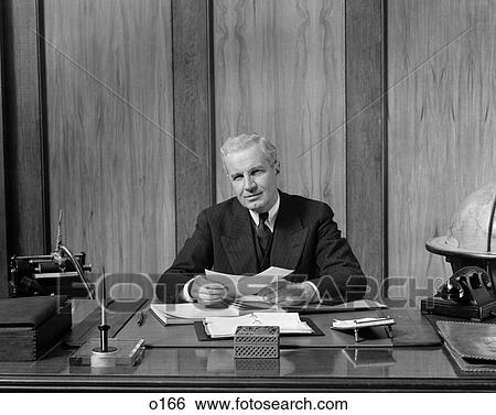 1940 1940S Retro Man Desk Business Paperwork Telephone Typewriter View Large Photo Image Stock Photograph - 1940 1940S Retro Man Desk Business Paperwork Telephone Typewriter . Fotosearch
