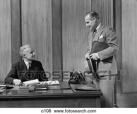 Stock Photo - 1940 1940S Retro Men Business Meeting Suit Hat Telephone . Fotosearch