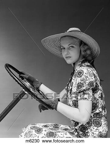 1940 1940S Retro Woman Steering Wheel Car Hat Sun Dress Gloves View Large Photo Image Stock Image - 1940 1940S Retro Woman Steering Wheel Car Hat Sun Dress Gloves . Fotosearch