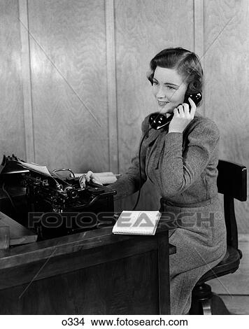 1940 1940S Retro Woman Telephone Answer Secretary Desk Receptionist Notepad View Large Photo Image Picture - 1940 1940S Retro Woman Telephone Answer Secretary Desk Receptionist Notepad . Fotosearch