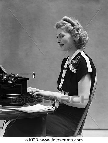 1940 1940S Retro Woman Typewriter Work Secretary Smile View Large Photo Image Stock Image - 1940 1940S Retro Woman Typewriter Work Secretary Smile . Fotosearch