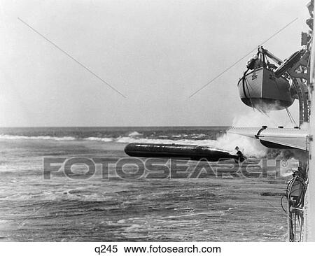 Stock Photography - 1940 1940S Torpedo Being Fired From Side Of Navy Ship Destroyer Weapon Weapons Torpedoes Naval Military . Fotosearch
