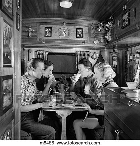 1940 1940S Trailer Interior Travel Tourist Men Women Couples View Large Photo Image Stock Photograph - 1940 1940S Trailer Interior Travel Tourist Men Women Couples . Fotosearch
