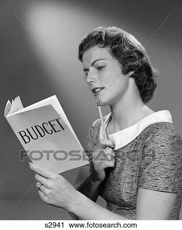 1940 1940S Woman Holding Budget Book And Pencil To Chin View Large Photo Image Stock Image - 1940 1940S Woman Holding Budget Book And Pencil To Chin . Fotosearch
