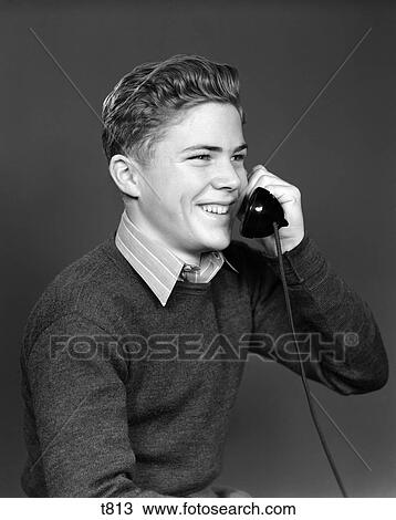 1940 1940S Young Boy Talking On Telephone Smiling View Large Photo Image Stock Image - 1940 1940S Young Boy Talking On Telephone Smiling . Fotosearch