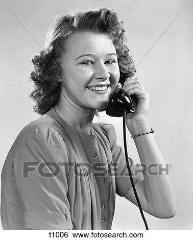 1940 1940S Young Girl Talking On Phone View Large Photo Image Stock Photograph - 1940 1940S Young Girl Talking On Phone . Fotosearch