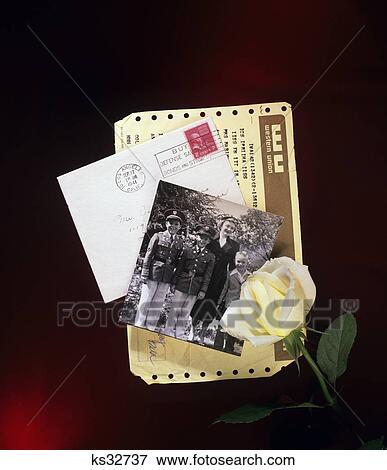 1940S 19502 Rose With Old Photograph Envelope And Telegram View Large Photo Image Stock Photo - 1940S 19502 Rose With Old Photograph Envelope And Telegram. Fotosearch