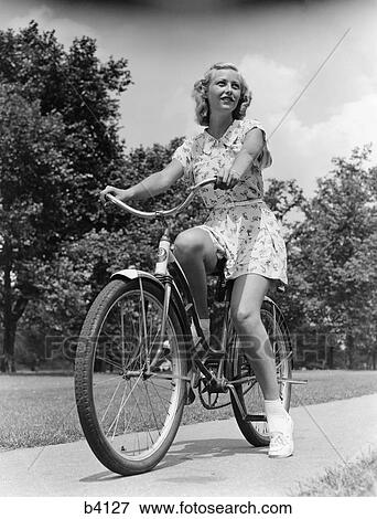 1940S 1950S Blonde Girl Bike On Sidewalk View Large Photo Image Stock Photo - 1940S 1950S Blonde Girl Bike On Sidewalk. Fotosearch