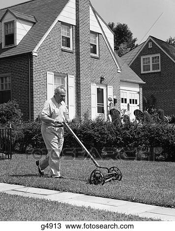 1940S 1950S Elderly Overweight Man Pushing Lawn Mower In Front Of Brick House View Large Photo Image Stock Image - 1940S 1950S Elderly Overweight Man Pushing Lawn Mower In Front Of Brick House . Fotosearch