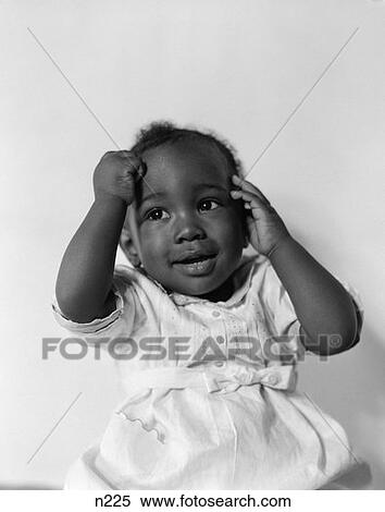 1940S 1950S Portrait African-American Baby Smiling Hands Up To Head View Large Photo Image Stock Photography - 1940S 1950S Portrait African-American Baby Smiling Hands Up To Head . Fotosearch
