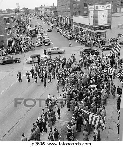 1940S 1950S Small Town Crowd People Men Women Military Group Assemble For Parade Flags Memorial Veterans Day Holiday View Large Photo Image Stock Photography - 1940S 1950S Small Town Crowd People Men Women Military Group Assemble For Parade Flags Memorial Veterans Day Holiday. Fotosearch