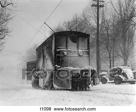 1940S Abandoned Train Car On City Street In Winter With Snow Broken Window In Front Car In Background Philadelphia View Large Photo Image Stock Photo - 1940S Abandoned Train Car On City Street In Winter With Snow Broken Window In Front Car In Background Philadelphia . Fotosearch
