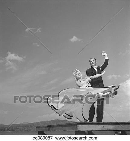 Stock Photo - 1940S Ballroom Dancing Couple Man Lifting Woman Waist High . Fotosearch