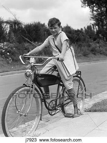 1940S Boy On An Elgin Bike Carrying Newspapers In A Sling Wearing Knee Socks And Sneakers View Large Photo Image Stock Image - 1940S Boy On An Elgin Bike Carrying Newspapers In A Sling Wearing Knee Socks And Sneakers . Fotosearch