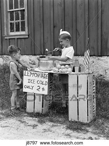 1940S Boy Running Lemonade Stand On Orange Crates Selling To Little Boy In Short Pants American Flag Business Ladle Backyard View Large Photo Image Stock Photo - 1940S Boy Running Lemonade Stand On Orange Crates Selling To Little Boy In Short Pants American Flag Business Ladle Backyard. Fotosearch