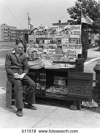 1940S Boy Sitting At Corner Newsstand Writing In Notepad View Large Photo Image Stock Photo - 1940S Boy Sitting At Corner Newsstand Writing In Notepad . Fotosearch